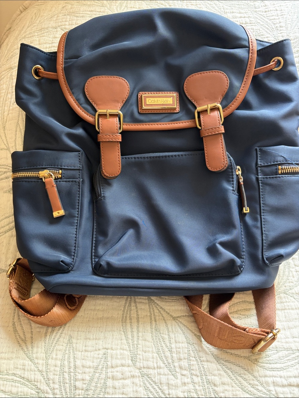 Calvin Klein Navy Backpack with Brown Trim and Gold Hardware
